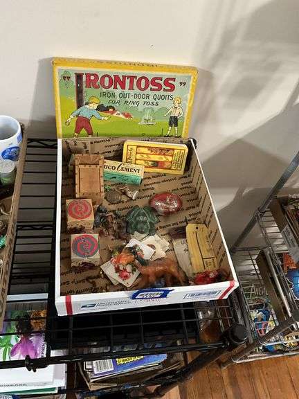 Collectibles lot: Irontoss game, animal figures, calling cards, tin egg, antique cast iron dogs and circus toys