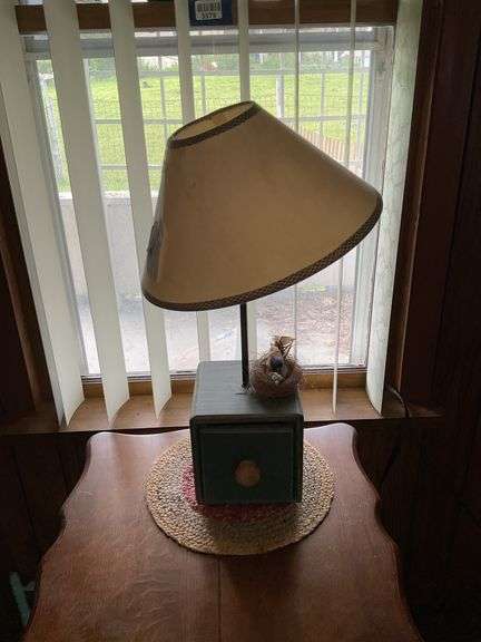 Two table lamps w/ shades: country wooden drawer base, and white ceramic base, and braided table mat