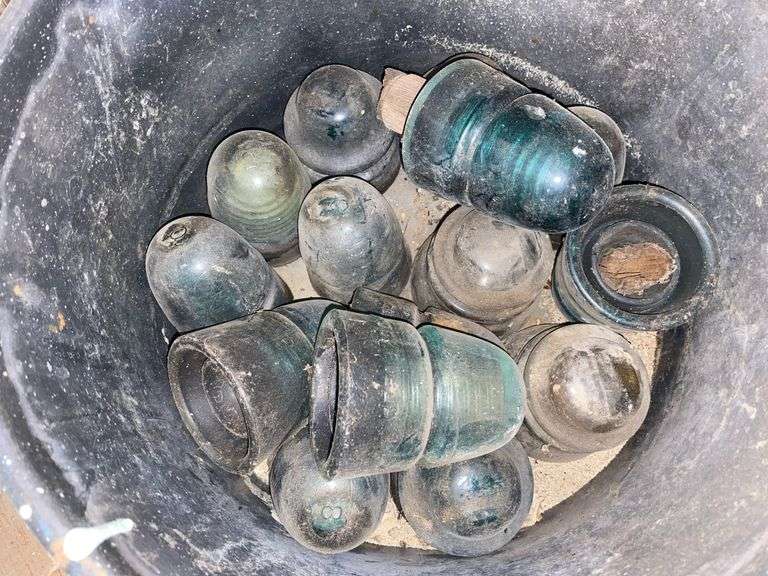 Glass insulators in speckled enamel kettle
