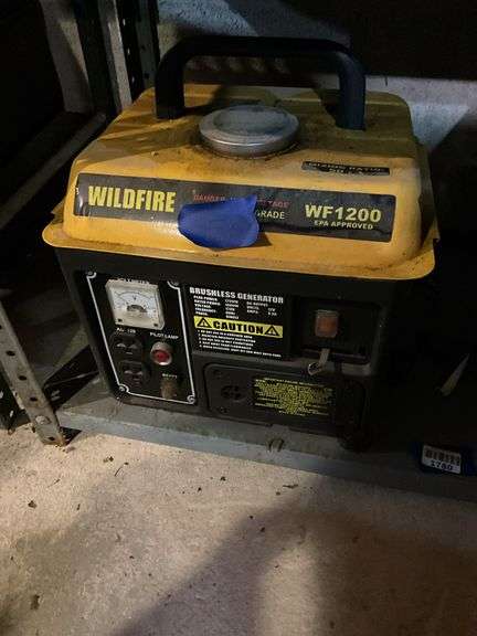 Contents of shelf: Wildfire WF1200 generator, vintage slide projector