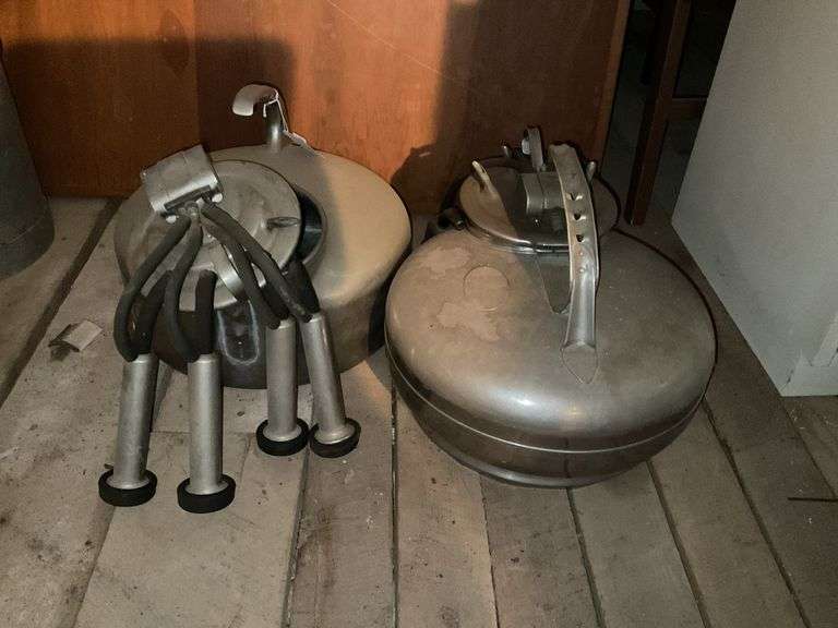 Two stainless milker canisters, *** PLEASE NOTE: This item has no stair access and must be picked up on July 15th between 11:00-1:30PM. Item will be removed from loft for pickup.