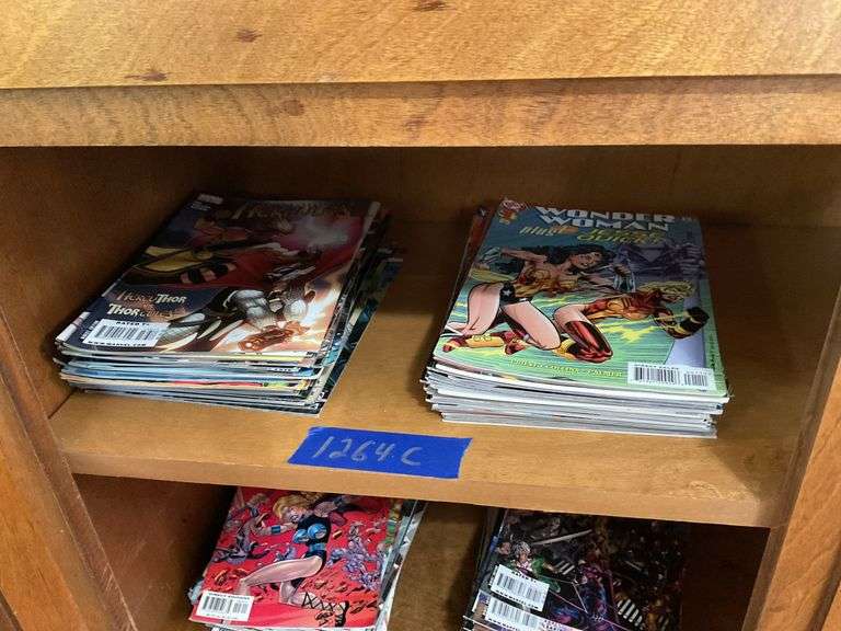Comic books including: Vampirella, Wonder Woman, Uncle Sam