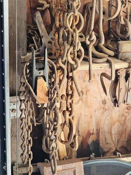 Tow chains, hay bale hook, misc