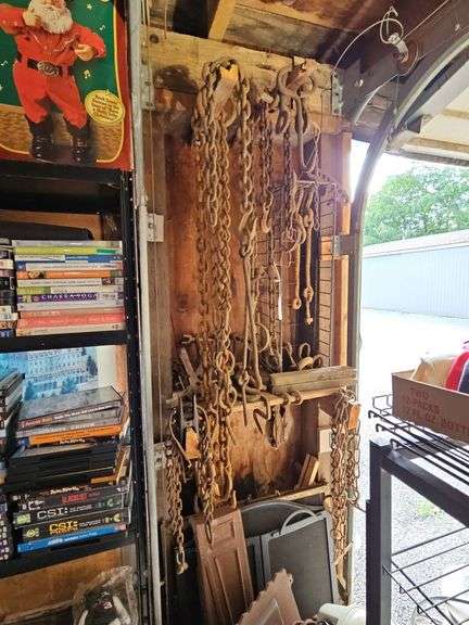 Tow chains, hay bale hook, misc