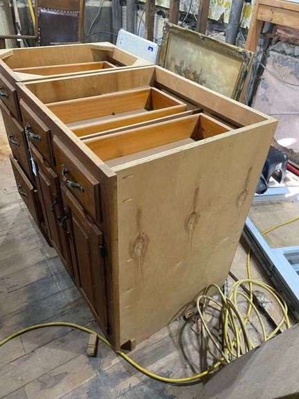 Two oak base cabinets 27x24x35 and 18x24x35