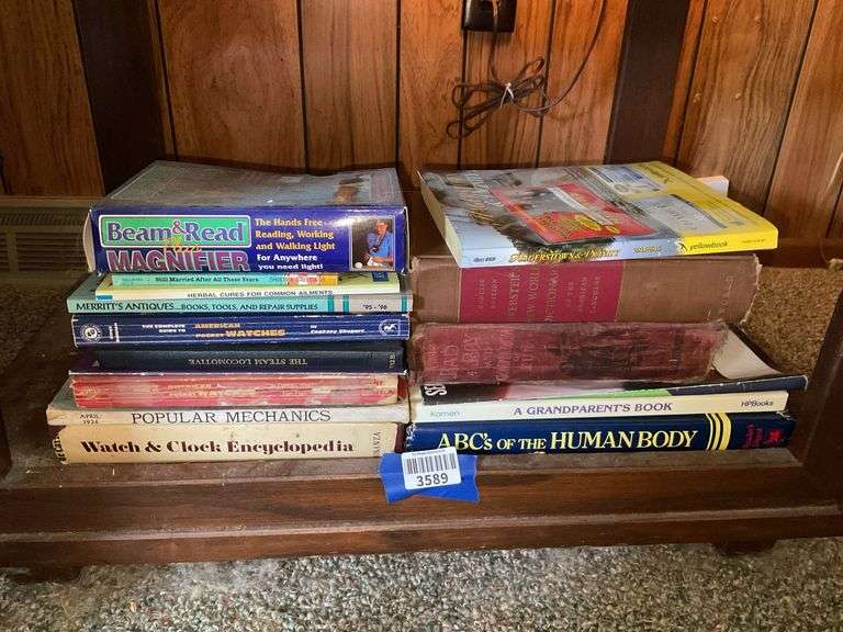 Lighted magnifier and books lot: clocks & watches, steam locomotive, Hagerstown directory, reference, misc