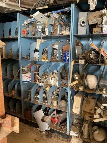 Metal shelf unit and contents: electrical, lamp parts, door hardware