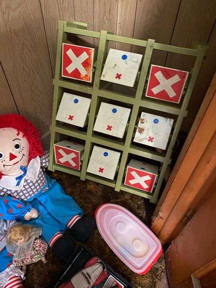 Vintage riding horse and contents of closet: baby scale, toy rifles, child's turntable, Raggedy Ann & Andy dolls, toy cars, misc toys
