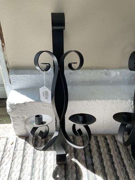 Pair of wrought metal double candle wall sconces