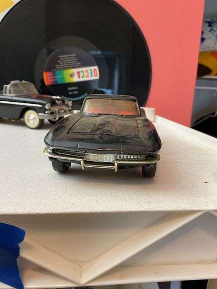 Two model cars: Dale Earnhardt 55 Chevy and Big A Auto Parts 30 year 1963 Corvette