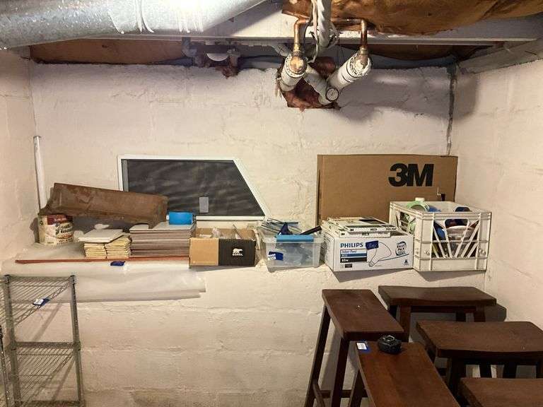Ceramic tiles, wood bracket shelf, bungee cords, paint rollers, tape, misc