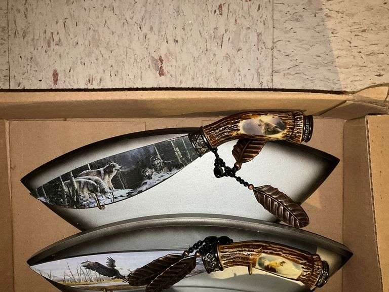 Three decorated wildlife knives/plaques
