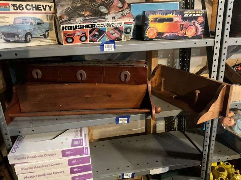 Wooden bracket shelves, metal horse cutouts
