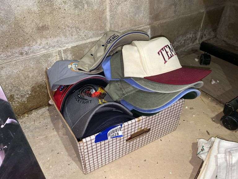 Box of baseball caps