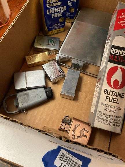 Cigarette lighters, lighter fuel, Camel blender shot glasses