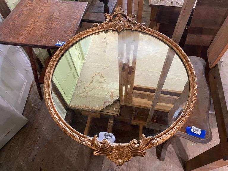 Oval mirror in gilt Rococo frame 30x39