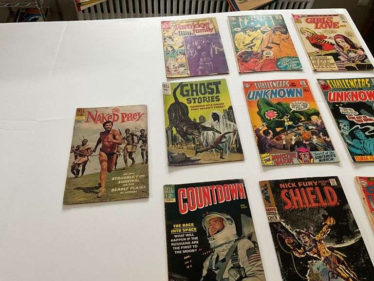 Comic books including: Lois Lane, Captain Storm, Army, Batman