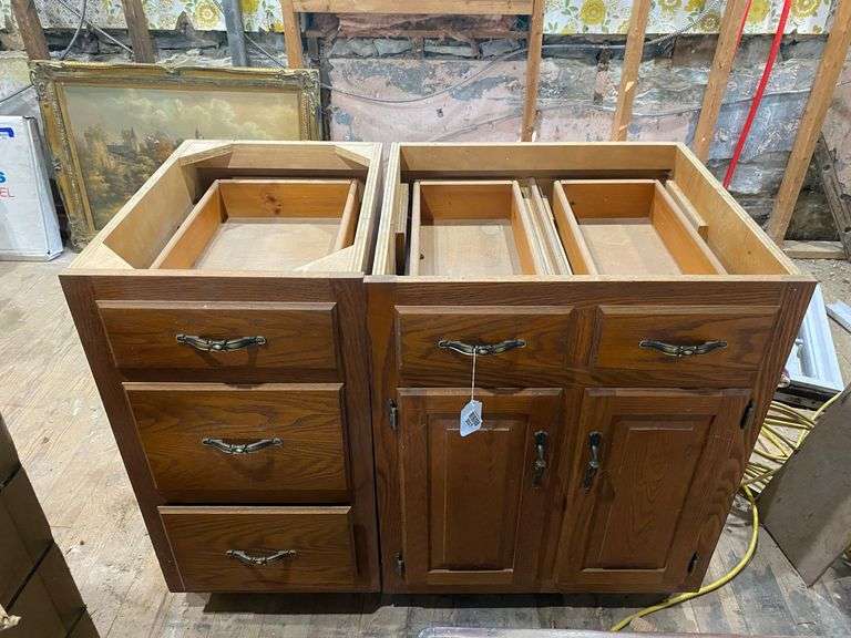 Two oak base cabinets 27x24x35 and 18x24x35