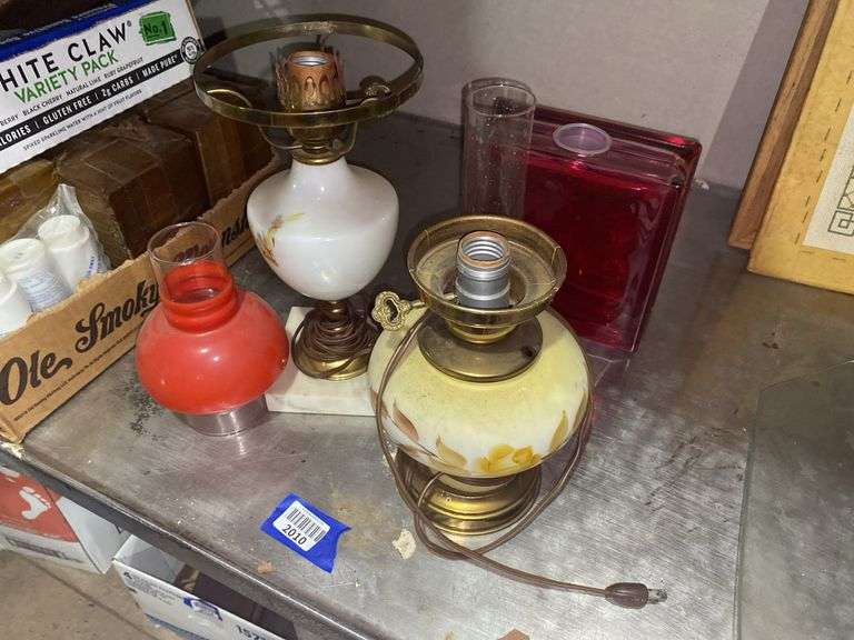 Two lamp bases, two glass chimneys, glass block