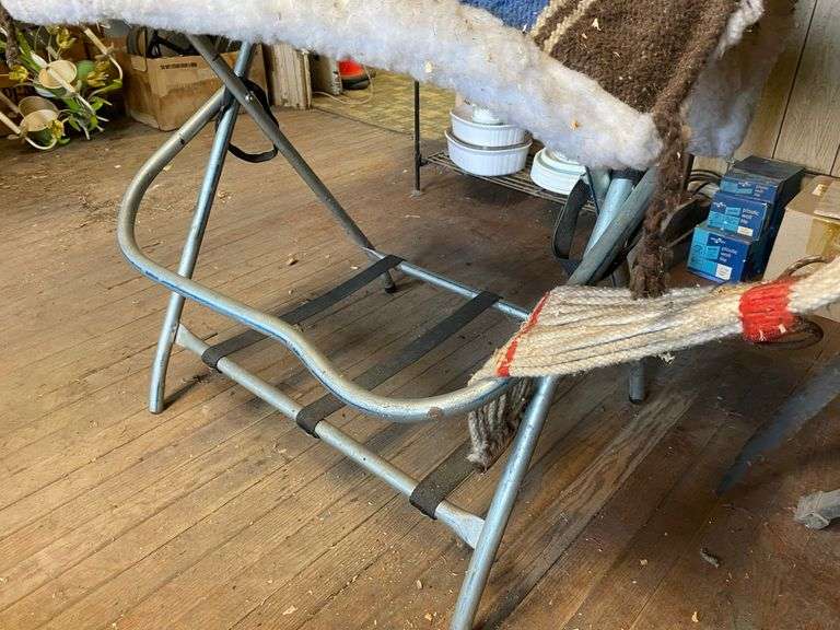 Fancy tooled leather saddle, saddle blanket,  and stand