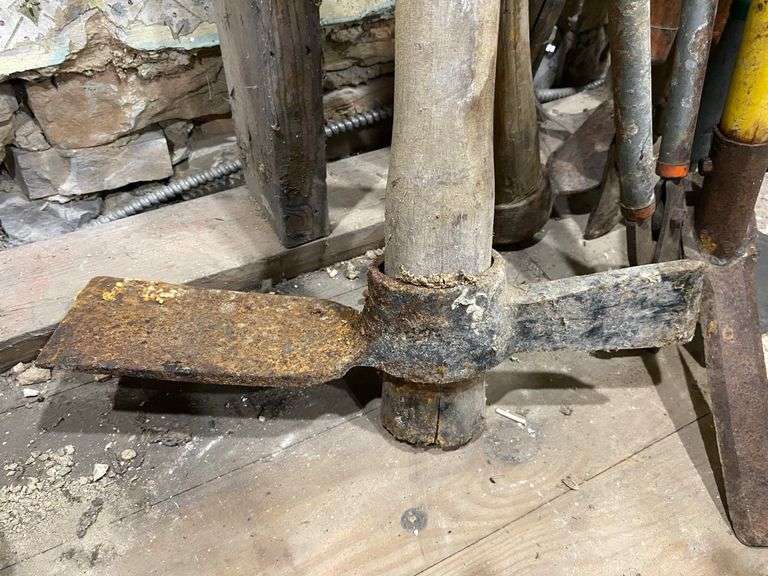 Tool lot including: mattock, hoe, loppers