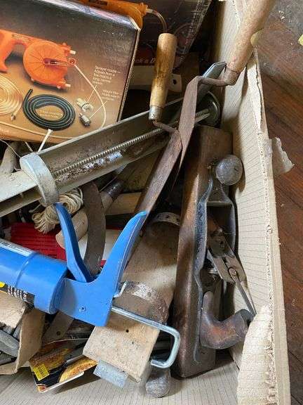 Plane, caulking guns, trowels, hand pump, misc