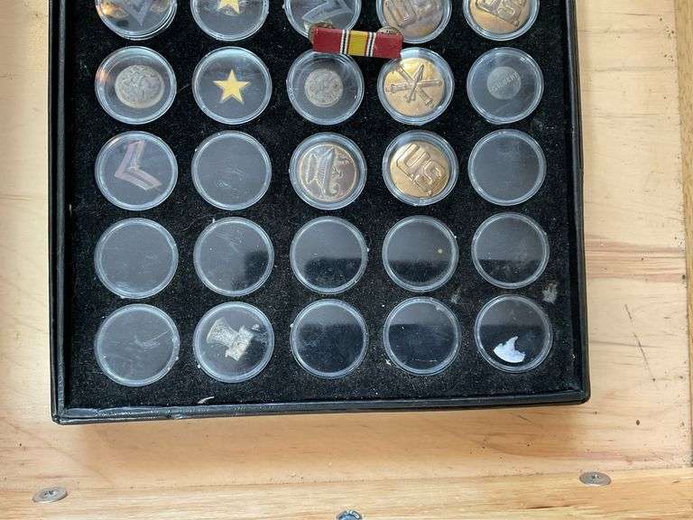 Military buttons and insignia