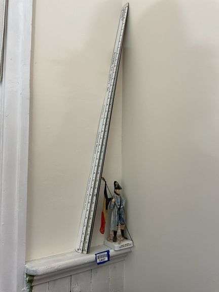 Eagle Bearer military figurine, and advertising yardsticks