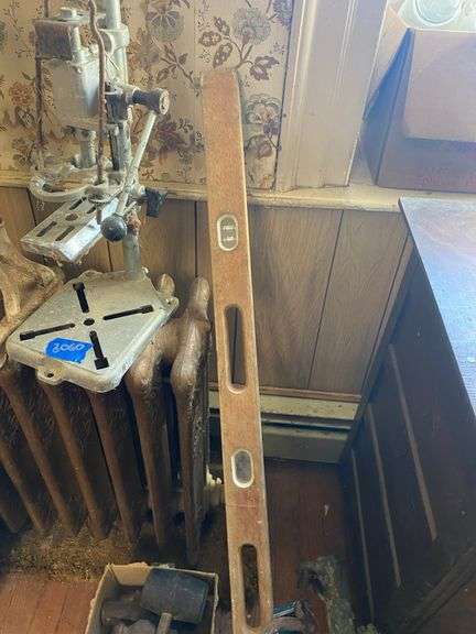 Wooden level, single tree, mallet and hammers, misc tools