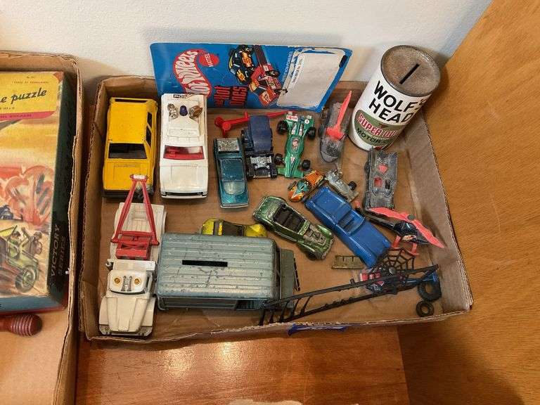 Collectibles lot: toy cars, Wolf’s Head oil bank, includes red line hot wheels