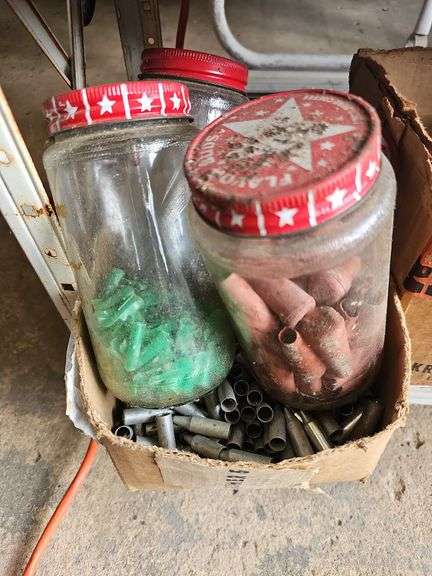 Contents of shelf: archery arrows and supplies