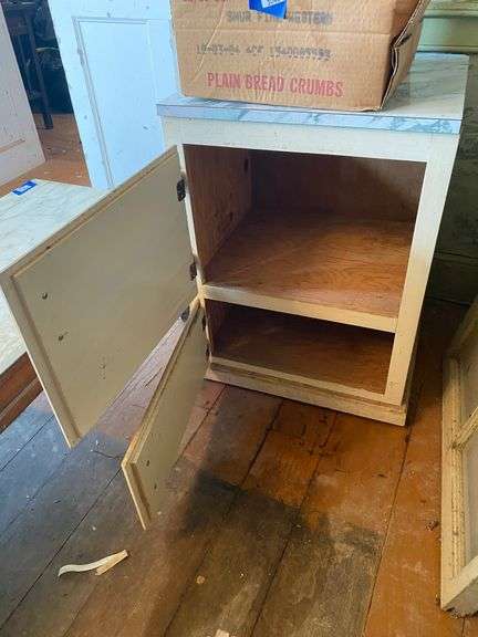 Base cabinet w/ formica top, NRA pistol targets, shot shells 20.5x17x28