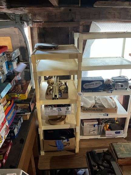 White plastic shelf unit - no contents