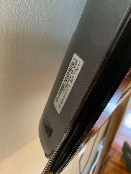 LG wall mounted TV model: 47LD520 w/ remotes, bring tools to remove.