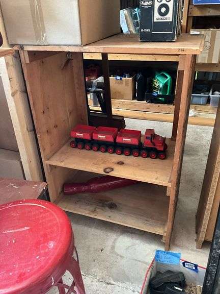 Wooden shelf unit covered w/ drawings - no contents 27.5x37x16.5
