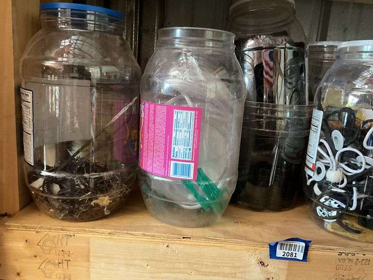 Contents of shelf: jars of hardware, ball ties, misc