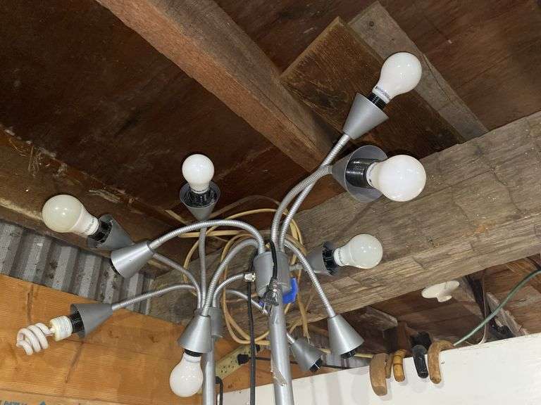 Two multi-lite adjustable arm floor lamps