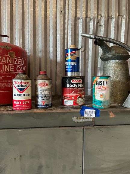 Vintage automotive advertising tins
