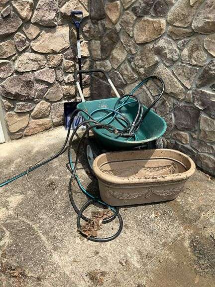 Wheelbarrow, garden hose, planter box, snow shovel