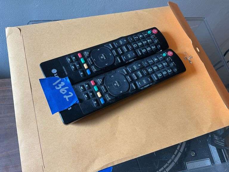 LG wall mounted TV model: 47LD520 w/ remotes, bring tools to remove.