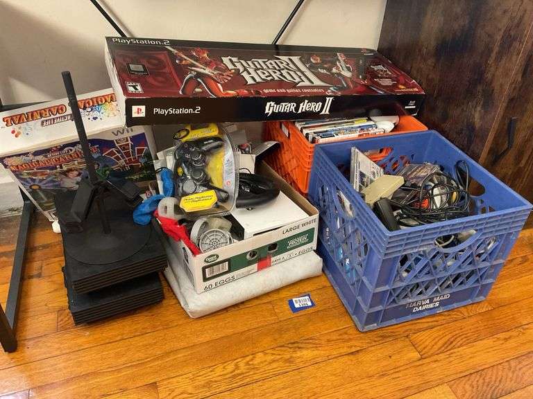 Sony PlayStation 2 consoles, Guitar Hero II, Wii, controllers, games, and accessories