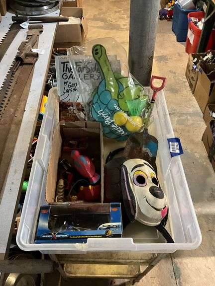 Underdog Halloween mask, toy helicopter, tin sand shovel, Far Side 4 book, misc toys