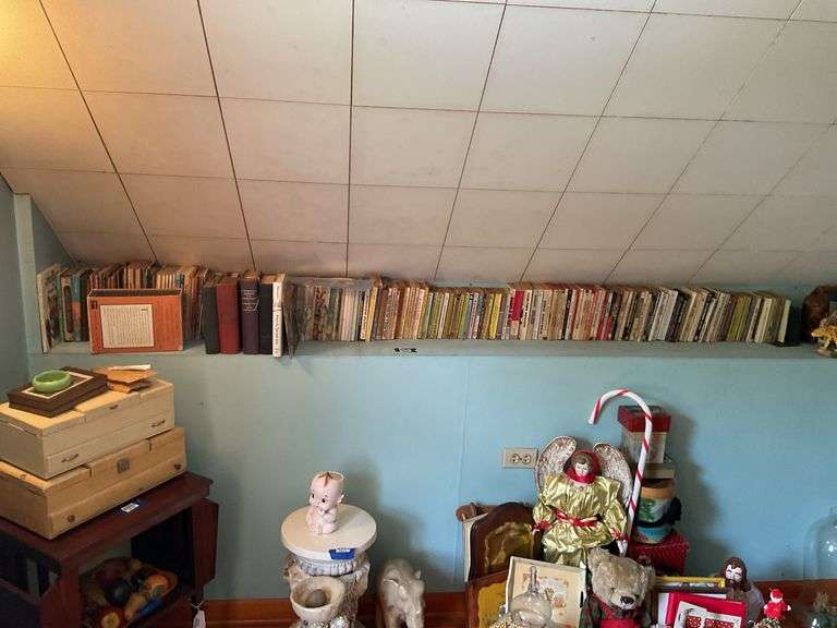 Shelf of books: Poe boxed set, older paperbacks, Readers Digest, classics, misc