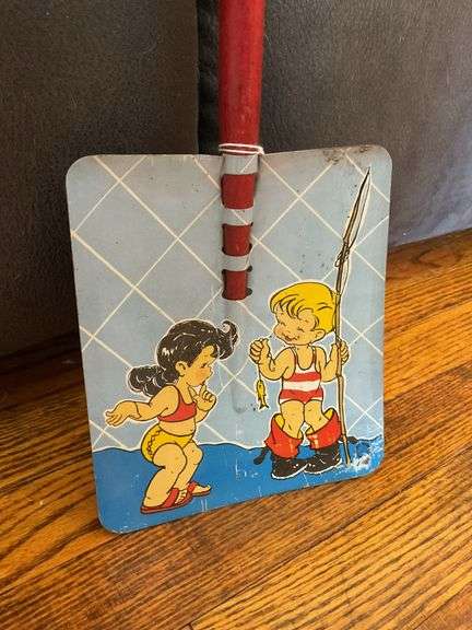 Vintage litho tin toy shovel
