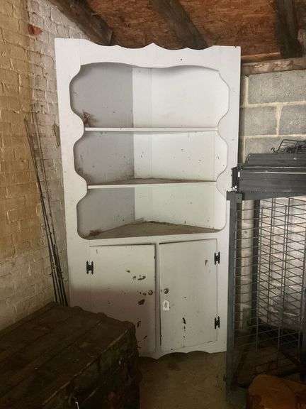 White corner cupboard w/ open top shelving, cupboard base