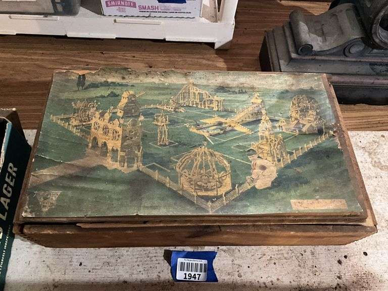 Antique toy wooden building set in wooden box w/ paper print on top of lid