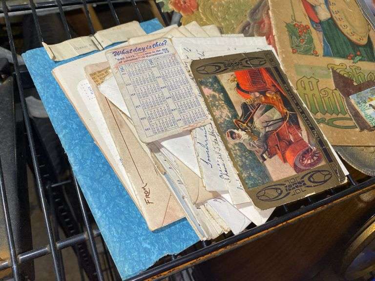 Paper ephemera including: postcards, child's Christmas book, 1960 advertising calendar