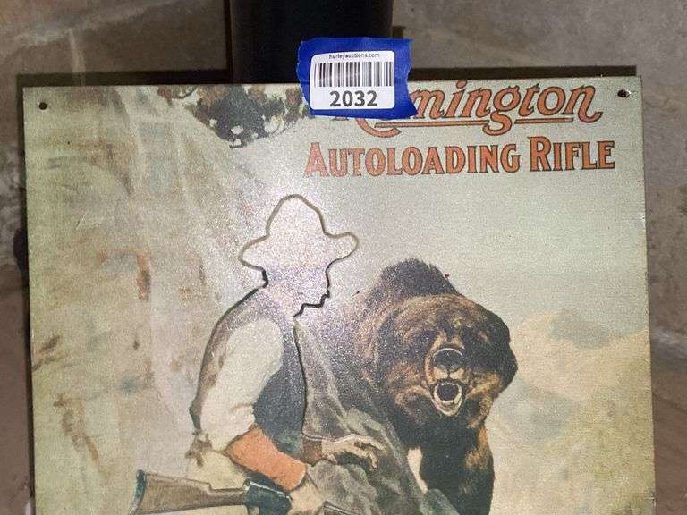 Remington tin advertising sign
