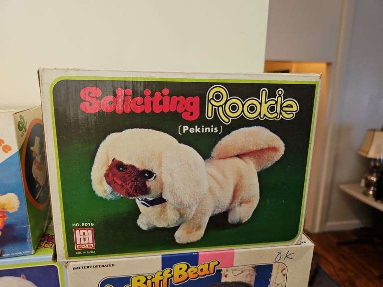 Wind-up and battery op toys in boxes including: Mother Goose, dog, pig, bears, calf