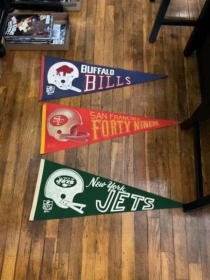Six pennants: Buffalo Bills (autographed), Forty-Niners, Jets, Bengals, Notre dame, Aloha bowl